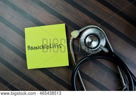 Concept Of Bronchiolitis Write On Sticky Notes Isolated On Wooden Table.