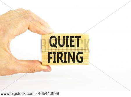 Quiet Firing Symbol. Concept Words Quiet Firing On Wooden Blocks. Beautiful White Table White Backgr