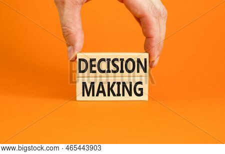 Decision Making Symbol. Concept Words Decision Making On Wooden Blocks. Beautiful Orange Table Orang