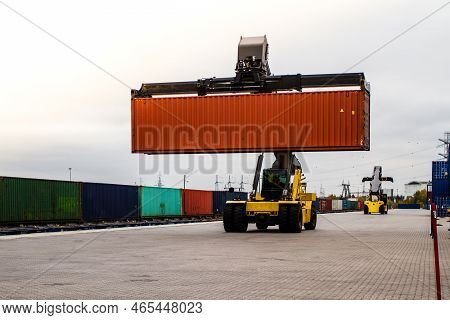 Forklift Handling Cargo Container. Freight Container Loading. Container Handler.  Logistics Import E