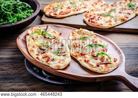 French Tarte Flambee With Cream Cheese, Bacon And Onions. Flammkuchen From Alsace Region