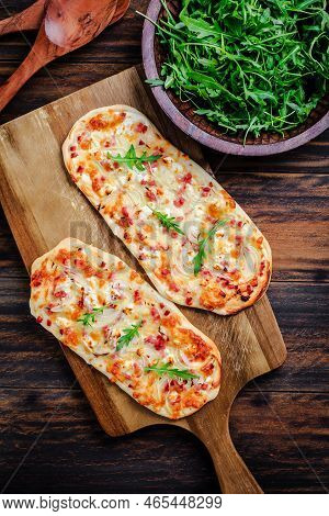 French Tarte Flambee With Cream Cheese, Bacon And Onions. Flammkuchen From Alsace Region