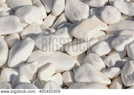 White Decarative Stones On Sunny Day In Garden, Abstract Natural Background