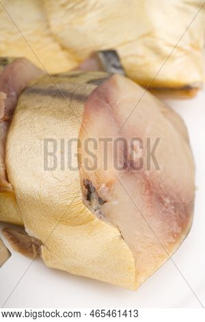 A Piece Of Juicy Fish Closeup. Vertical Snapshot