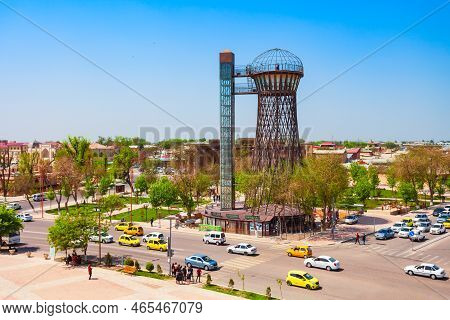 Bukhara, Uzbekistan - April 16, 2021: Bukhara Water Tower Or Shukhov Tower Is Located Opposite The A