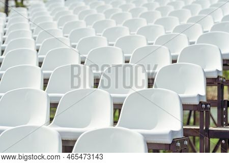 Seats Of Tribune On Sport Stadium. Concept Of Fans, Chairs For Audience, Cultural Environment Concep