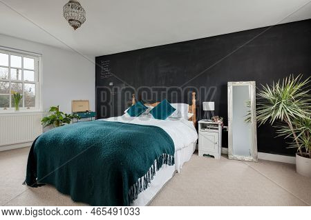 Fen Ditton, England - Jan 10 2019: Luxury Modern Contemporary Furnished Bedroom With Feature Black P