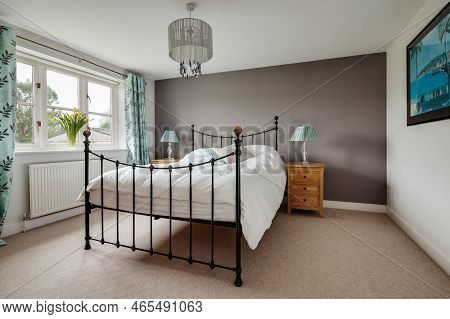 Fen Ditton, England - Jan 10 2019: Luxury Modern Contemporary Stylish Furnished Bedroom Wrought Iron