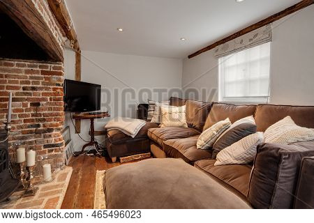 Saffron Walden, Essex, England - Sept 4 2018: Small Furnished Compact Cottage Living Room Filled Wit