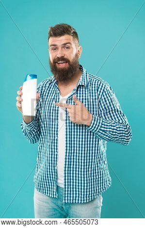 Shampoo For Daily Use. Body Care Cosmetic Bath Shower. Man Hold Shampoo Bottle. Hair Care. Skin Loti