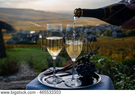 Tasting Of Premier Cru Sparkling White Wine With Bubbles Champagne On Outdoor Terrace With View On C