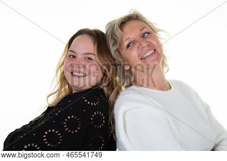 Two Tender Beautiful Women Of Different Ages Generations Together On White Background Daughter And E