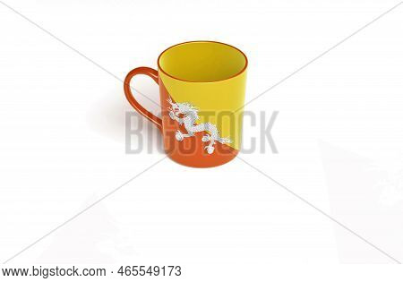 Kingdom Of Bhutan Cup National Flag On White Background.