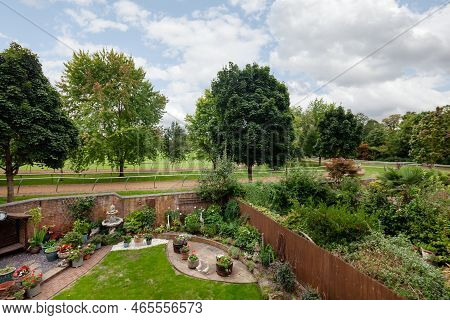 Newmarket, Suffolk, England - August 21 2018: Landscaped House Garden With View Over Horse Gallops