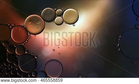 Abstract Colorful Food Oil Drops Bubbles And Spheres Flowing On Water Surface