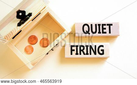 Quiet Firing Symbol. Concept Words Quiet Firing On Wooden Blocks. Beautiful White Table White Backgr