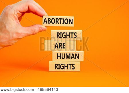 Abortion Rights Symbol. Concept Words Abortion Rights Are Human Rights On Wooden Blocks Businessman 
