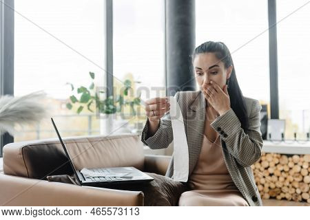 Woman Pays Her Bills Online. Stress From High Utility Bills. Saving Money Causes Stress And Discomfo