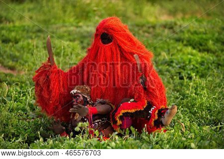 Nguehoh. Senegal. October 14, 2021. The Participant Of The Ritual Dances Is A Red Spirit Guide With 