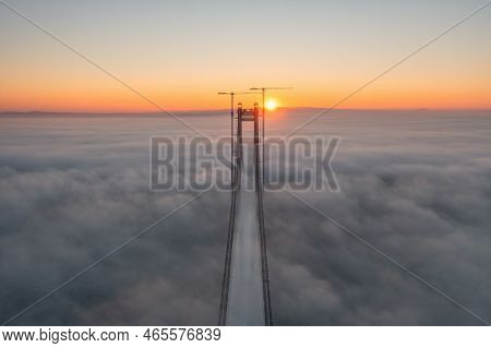 Panoramic Aerial Drone View From Above Of The Suspended Bridge Over Danube River, Under Construction