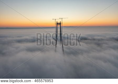 Panoramic Aerial Drone View From Above Of The Suspended Bridge Over Danube River, Under Construction