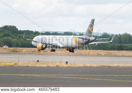 Muenster, Germany, July 9, 2022 Condor Airbus A321-211 Aircraft Is Taxiing To Its Take Off Position