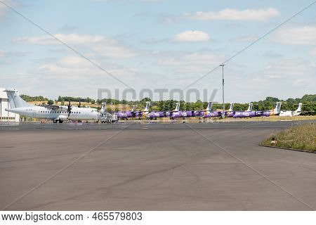 Saarbruecken, Germany, July 10, 2022 Bombardier Dhc-8-402q Dash 8 Propeller Aircraft At The Parking 