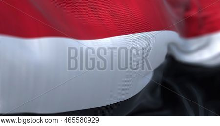 Close-up View Of The Yemen National Flag Waving. The Republic Of Yemen Is A State Located In Western