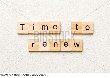 Time To Renew Word Written On Wood Block. Time To Renew Text On Table, Concept.