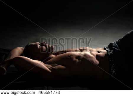 Sexy Naked Muscular Man With Sixpack Abs Lying In Bed. Attractive Young Gay. Sexy Handsome Playboy O