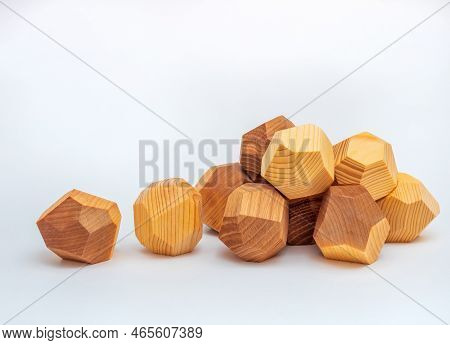 Tumi Ishi Wood Rocks On The White Background. Close-up