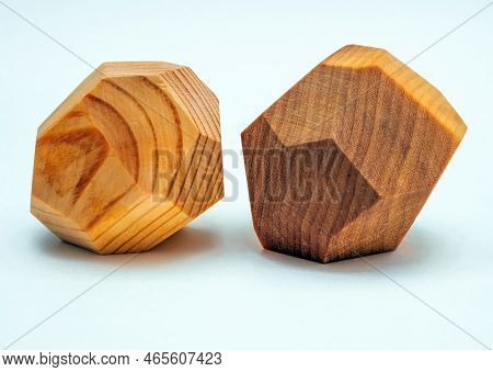 Tumi Ishi Wood Rocks On The White Background. Close-up