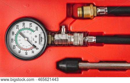 Monometer Close-up. Engine Compression Tester Isolated On White Background. Set For Testing The Inte
