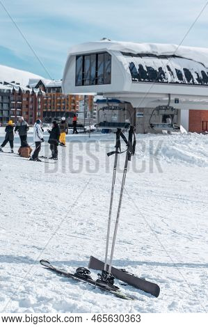 Two Ski Poles Equipment At Winter Slope On Mountaion
