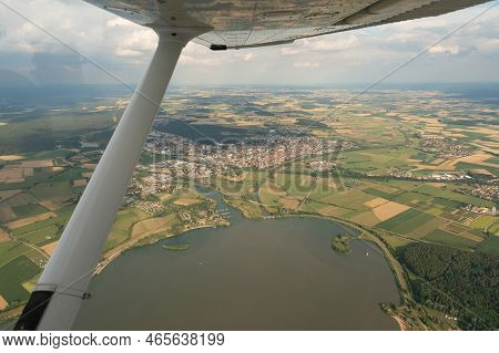 Gunzenhausen, Bavaria, Germany, July 9, 2022 Flight Abeam The City In A Small Plane