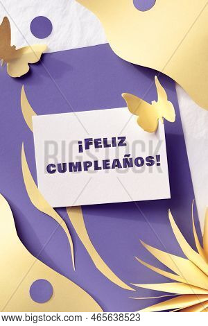 Feliz Cumpleanos Greeting In Spanish Means Happy Birthday. Springtime Birthday Greeting Paper Style 