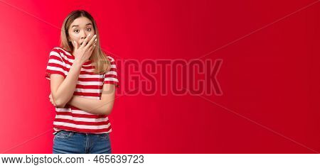 Shocked Asian Blond Girl Feel Empathy Hear Shocking News Gasping, Woman Drop Jaw Cover Opened Mouth 