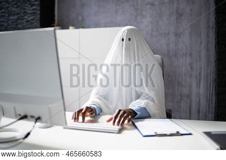 Ghostwriter In Office. Creative Ghost Writer Using Computer