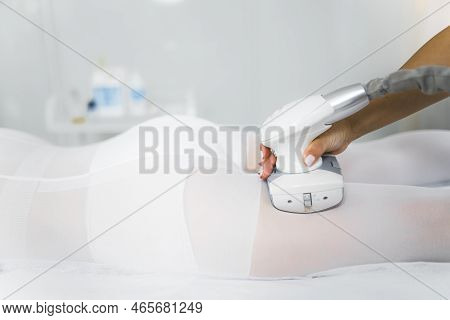 Lipomassage Technique Performed On The Back Of Thighs Of Asian Female Client Lying On Her Stomach. P