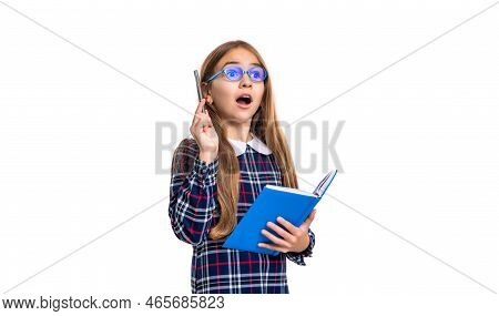 Surprised School Girl Noting Notes In Studio. School Girl Noting Notes. Photo Of School Teen