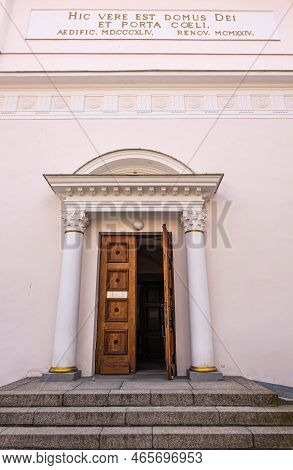 Estonia, Tallinn - July 21, 2022: St. Peter And St. Paul Cathedral. Closeup Of Brown Wooden Main Ent