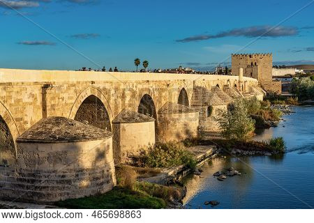 Cordoba, Spain - November 03, 2022: Roman Bridge, Across Guadalquivir River With Torre De Calahorra,
