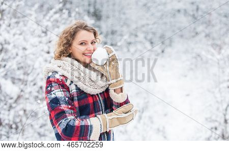 Feeling Rested. Cheerful Woman Enjoy Xmas Vacation. Woman Warm Clothes In Snowy Forest. Trees Covere