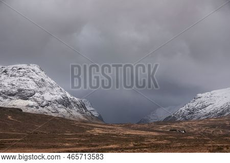 Stunning Dramatic Landscape Winter Image Of Iconic Stob Dearg Buachaille Etive Mor Mountain In Scott