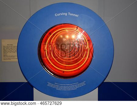 Siliguri - India
28th July 2022

A Tilted Curving Tunnel Of Lighted Rings At A Science Museum.