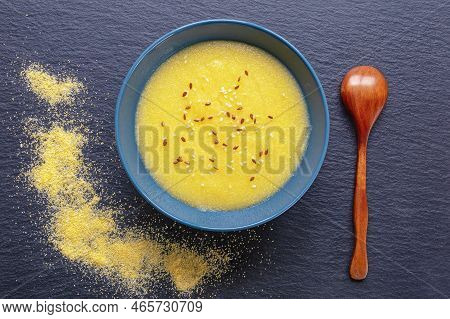 Healthy Breakfast. Cornmeal Porridge In A Bowl On  Table. Flat Lay, Copy Space