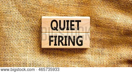 Quiet Firing Symbol. Concept Words Quiet Firing On Wooden Blocks. Beautiful Canvas Table Canvas Back