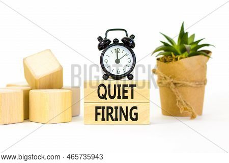 Quiet Firing Symbol. Concept Words Quiet Firing On Wooden Blocks. Beautiful White Table White Backgr