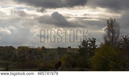 Suburban Neighborhoods. Hills And Fields In Autumn Under A Cloudy, Dark Sky . Uptown Ostrowiec, A Fa