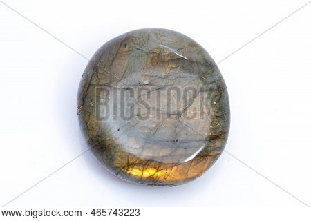 Natural Gemstone Labradorite Isolated On White Background. Dark Gray Labradorite With An Inner Iride